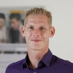 Porträt von John Bade (Mecklenburgische Versicherung)