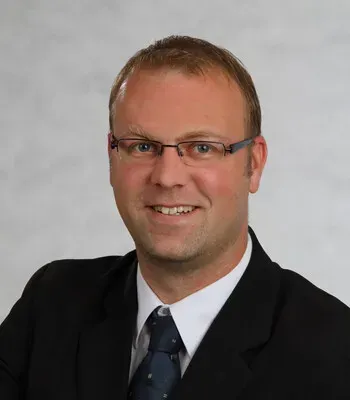 Porträt von Oliver Flock (Mecklenburgische Versicherung)